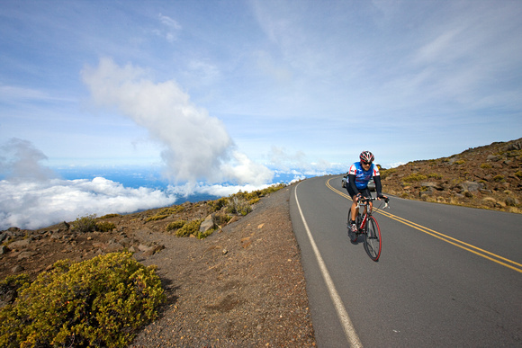 a cyclist approaches the summit of Haleakala....