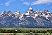 Snapping a cell phone pic of The Grand Tetons