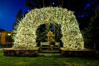 Moi under an arch of elk antlers